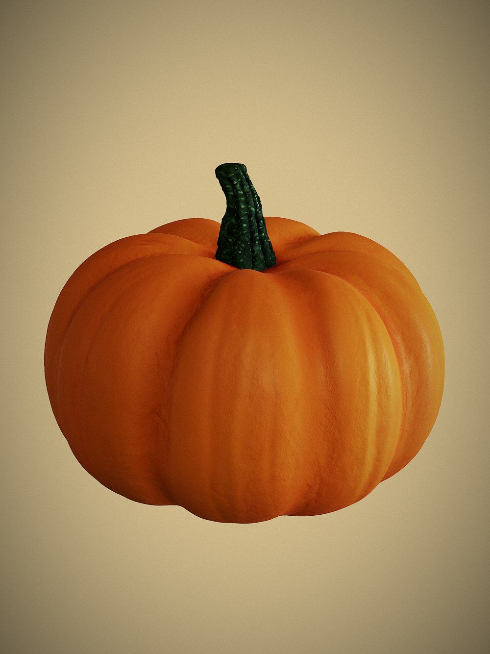 a large orange pumpkin with a green stem