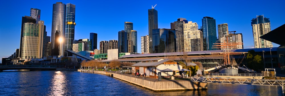 a river running through a city next to tall buildings