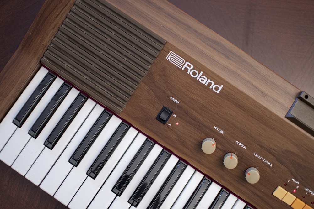 a close up of an electronic keyboard with many knobs