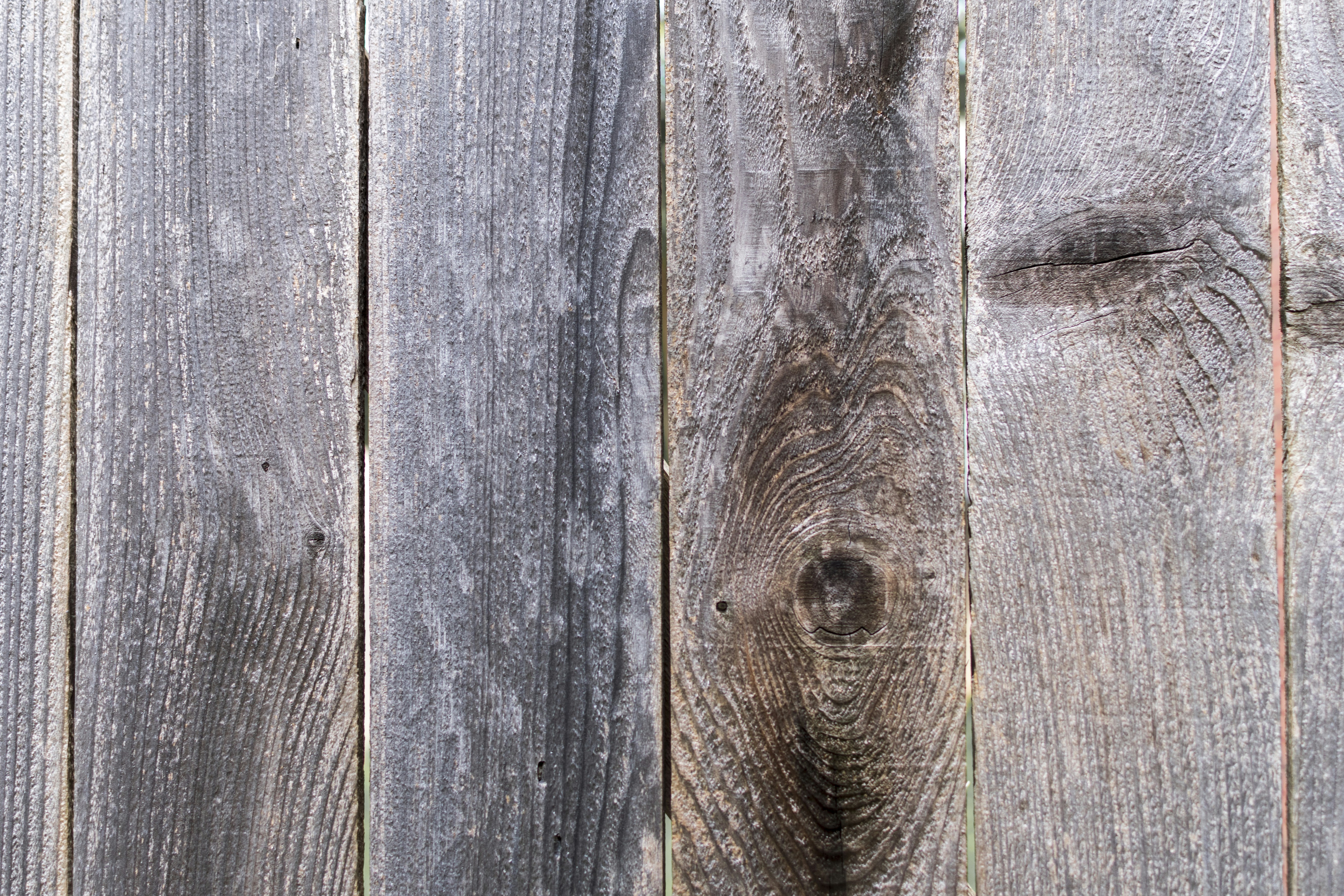 a close up view of a wooden fence