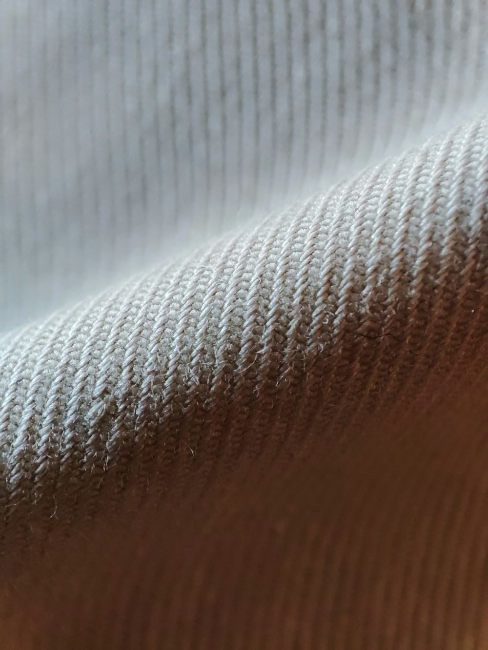 a close up of a brown and white fabric