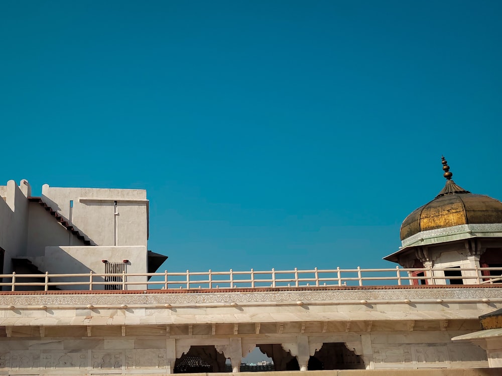 a large white building with a dome on top of it