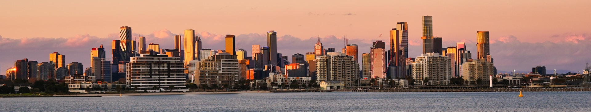 a view of a city skyline from across a body of water