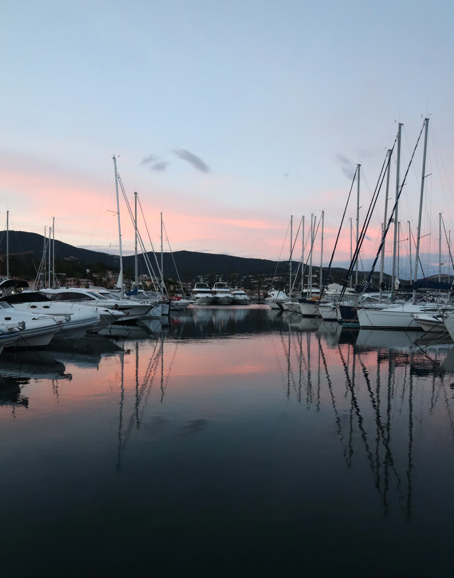 a bunch of boats that are sitting in the water