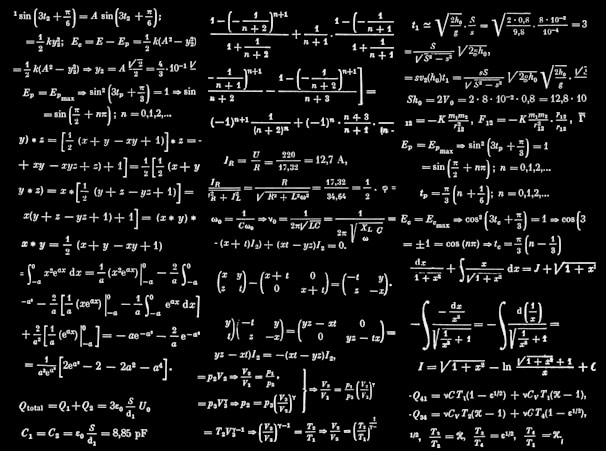 a black and white photo of a number of calculations