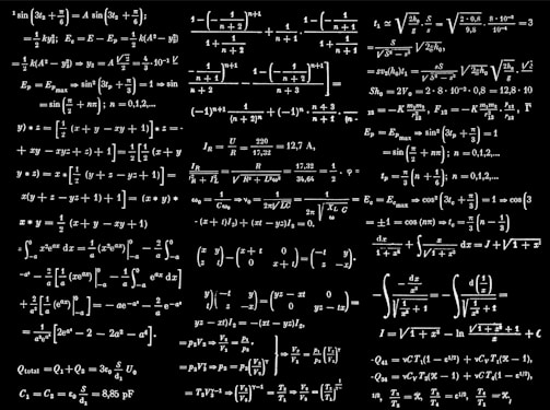 a black and white photo of a number of calculations