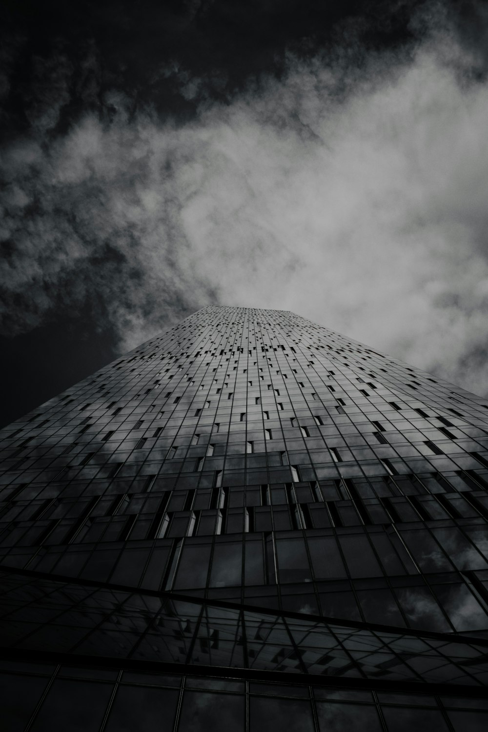 a black and white photo of a tall building