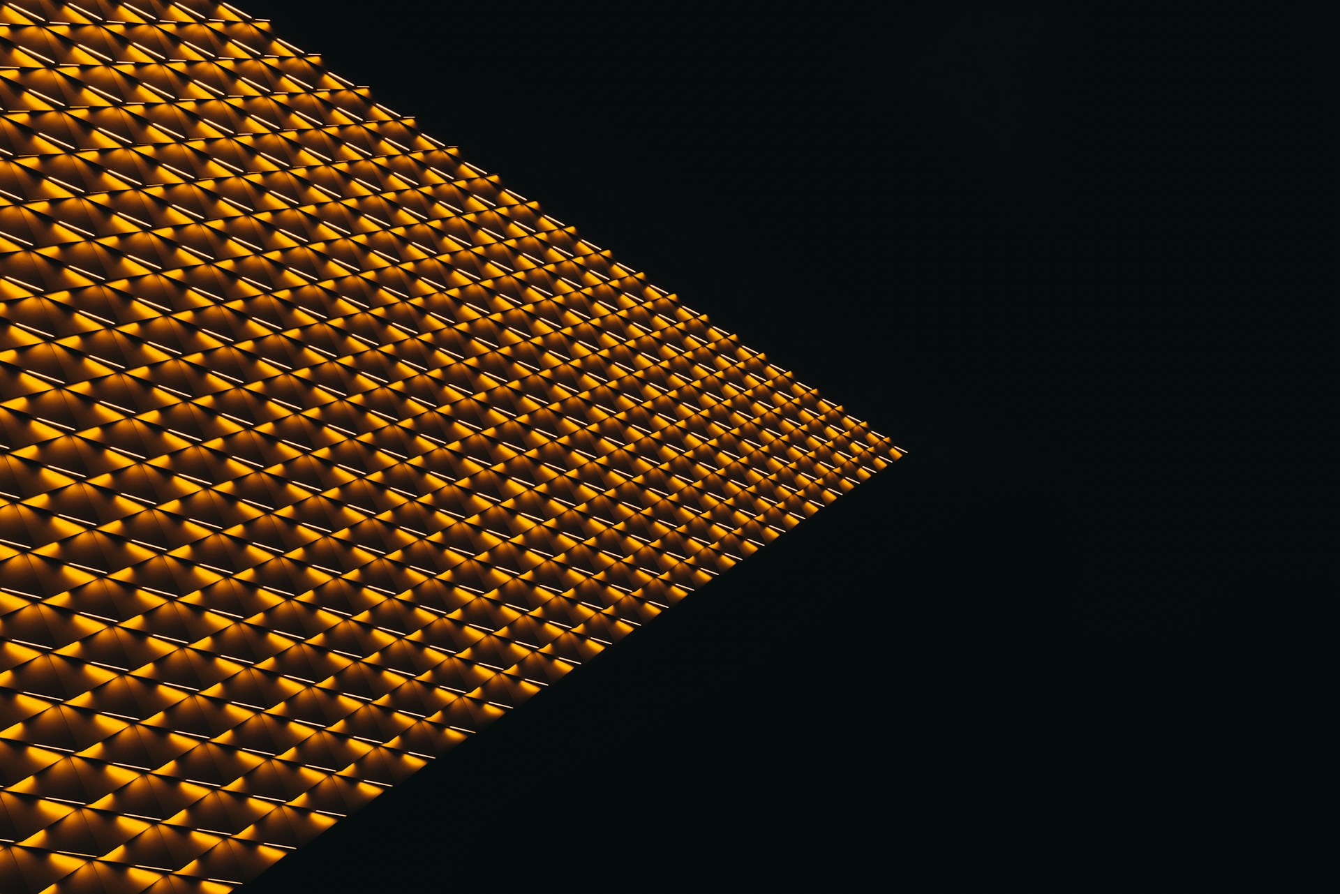 a close up of a yellow light on a black background