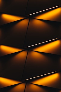 a close up of a wall with lights on it