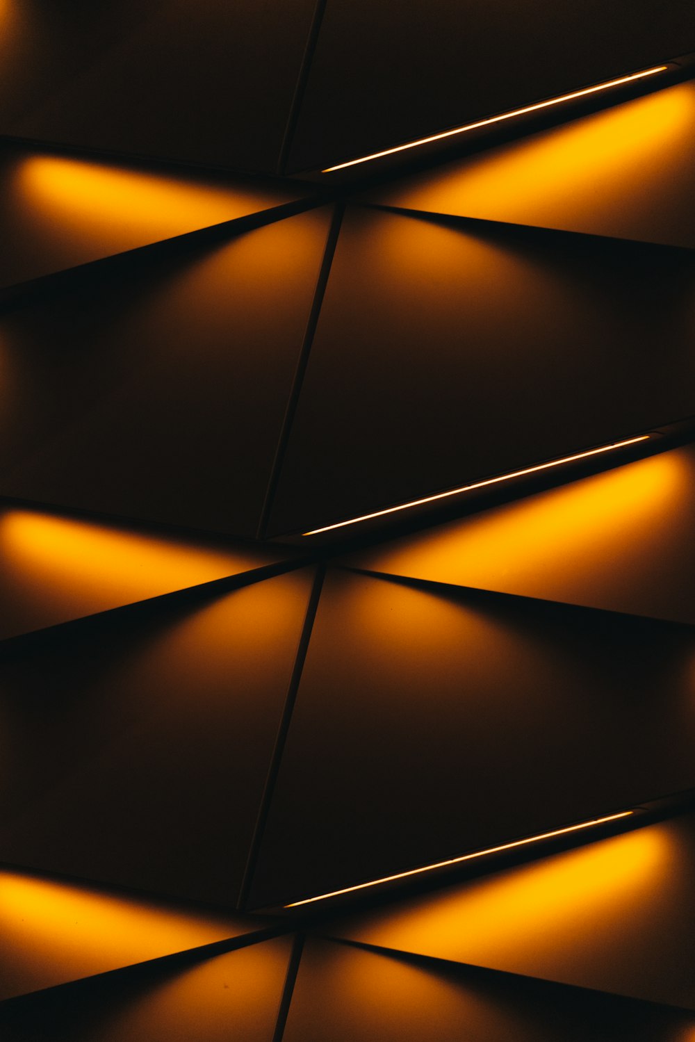 a close up of a wall with lights on it