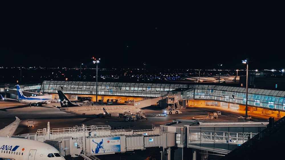 a large jetliner sitting on top of an airport tarmac