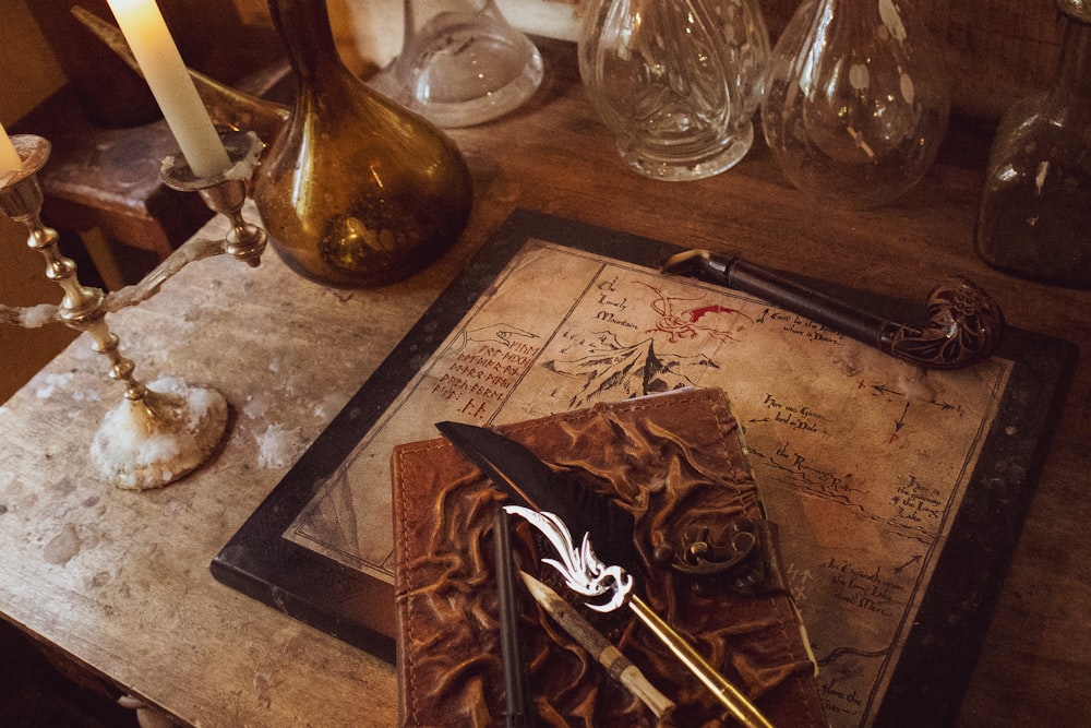 a table topped with a menu and a knife