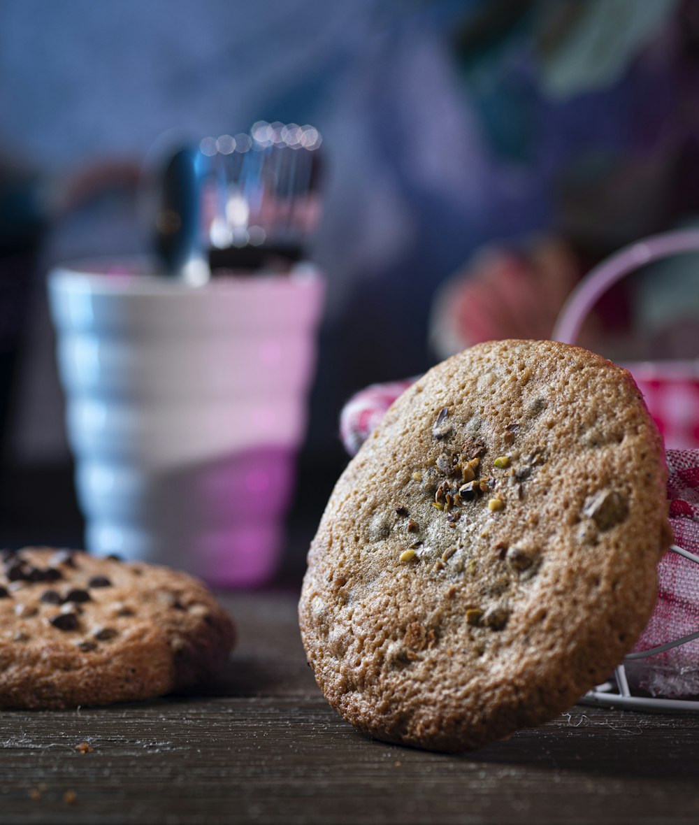 two cookies sitting next to each other on a table