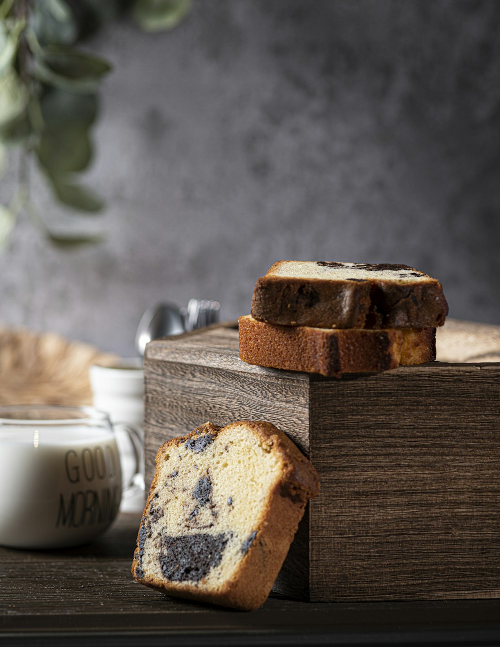 a loaf of bread sitting on top of a wooden block