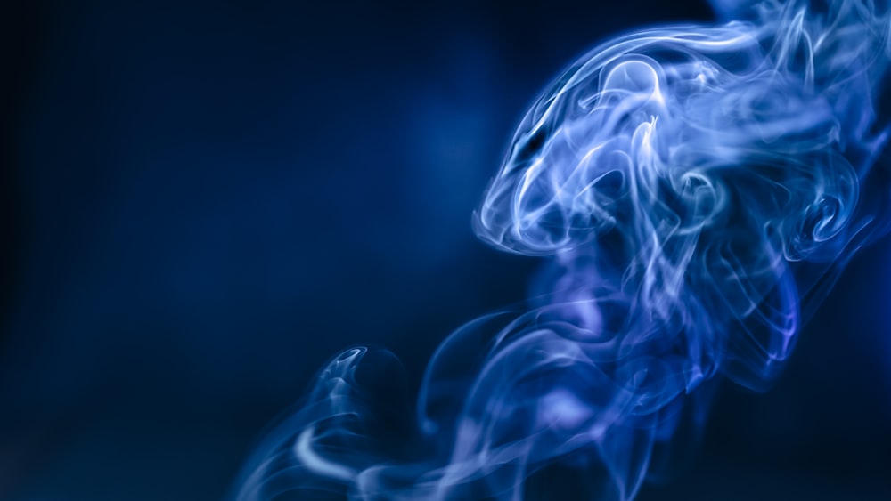 a blue smoke texture on a black background