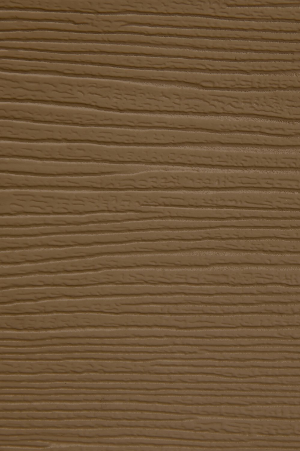 a close up of a brown wood texture