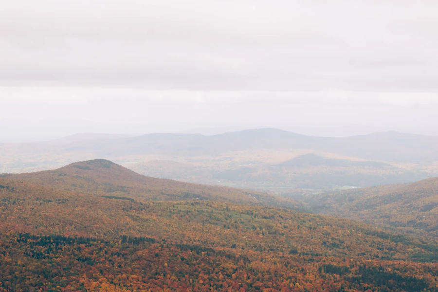 Autumn foliage rolling toward a distant ridge near Burlington, a scenic backdrop for free dating sites in Vermont
