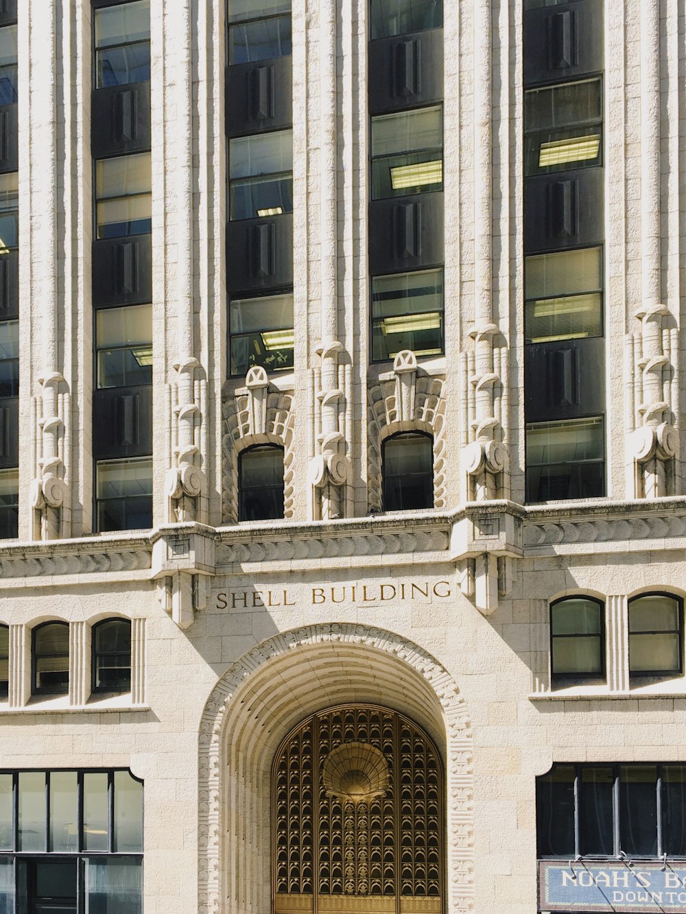 a tall building with a clock on the front of it