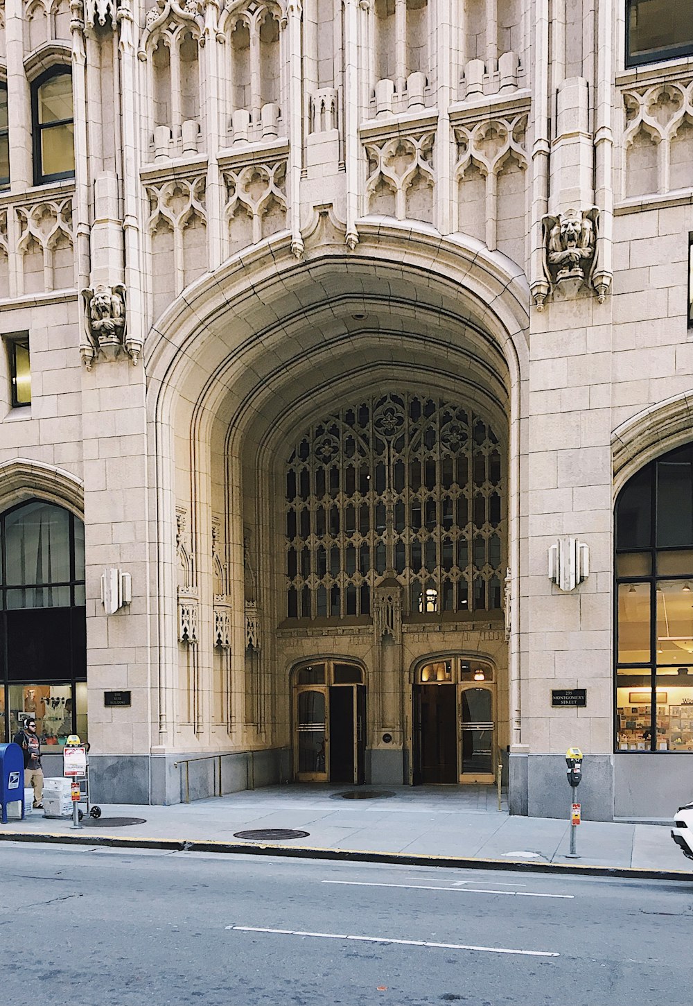 a car parked in front of a large building