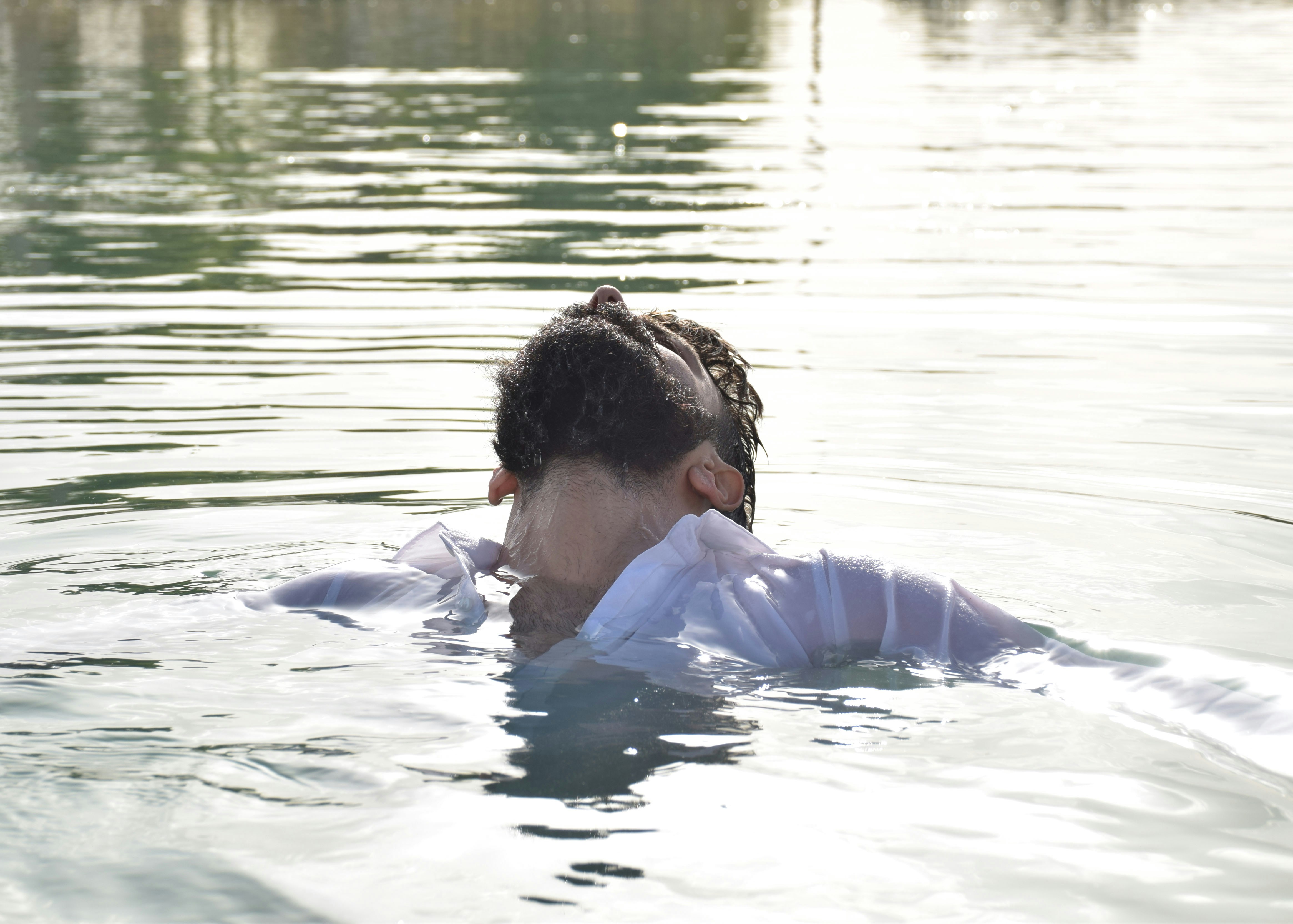 a person swimming in a body of water