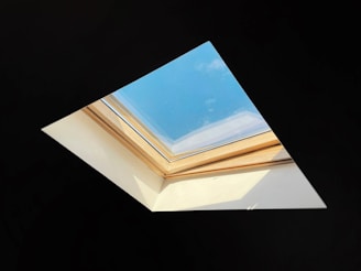 A clean skylight viewed from inside, showcasing soft-wash technique results.