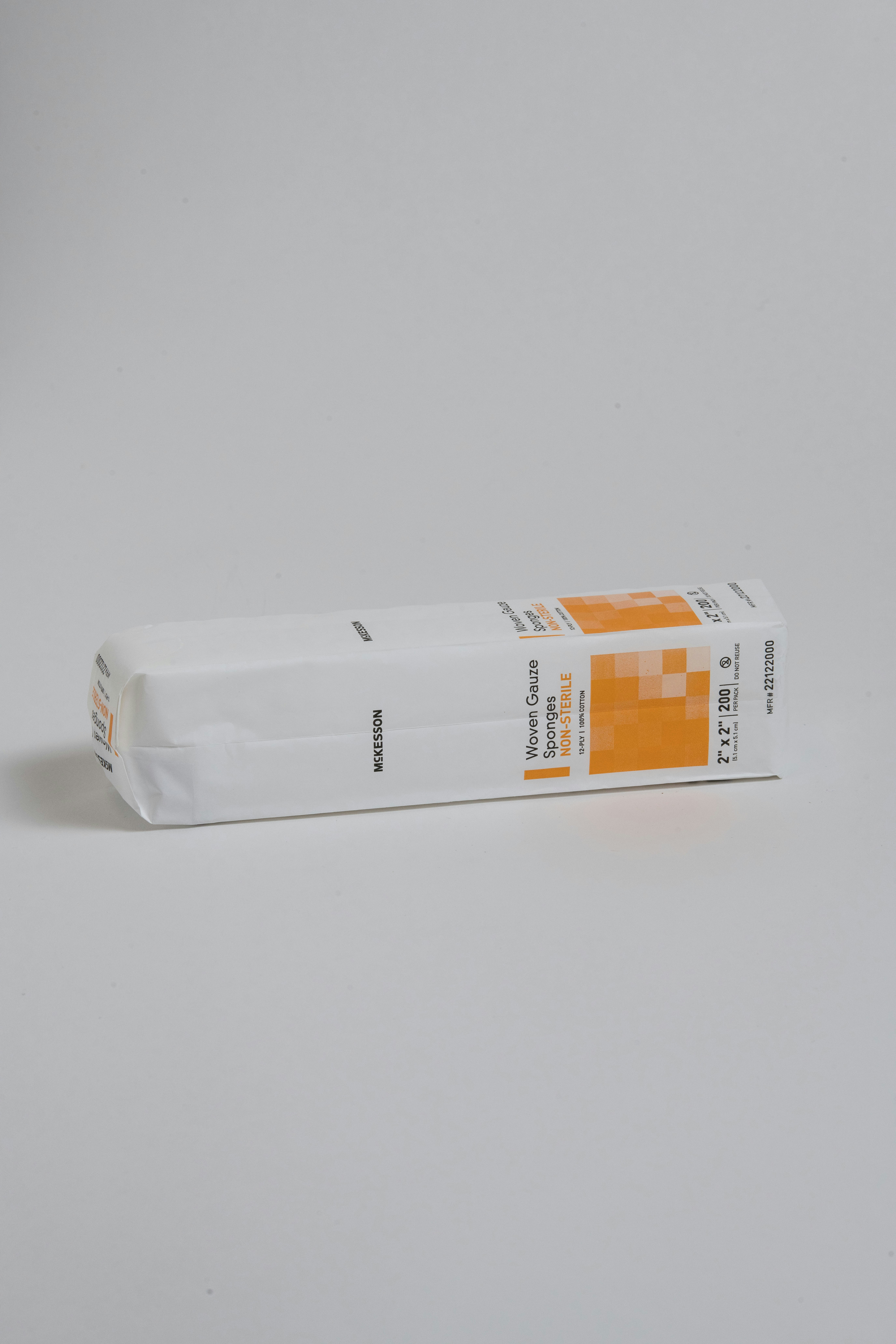 a tube of toothpaste sitting on a white surface