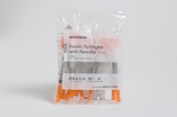 a package of needles with needles inside of it