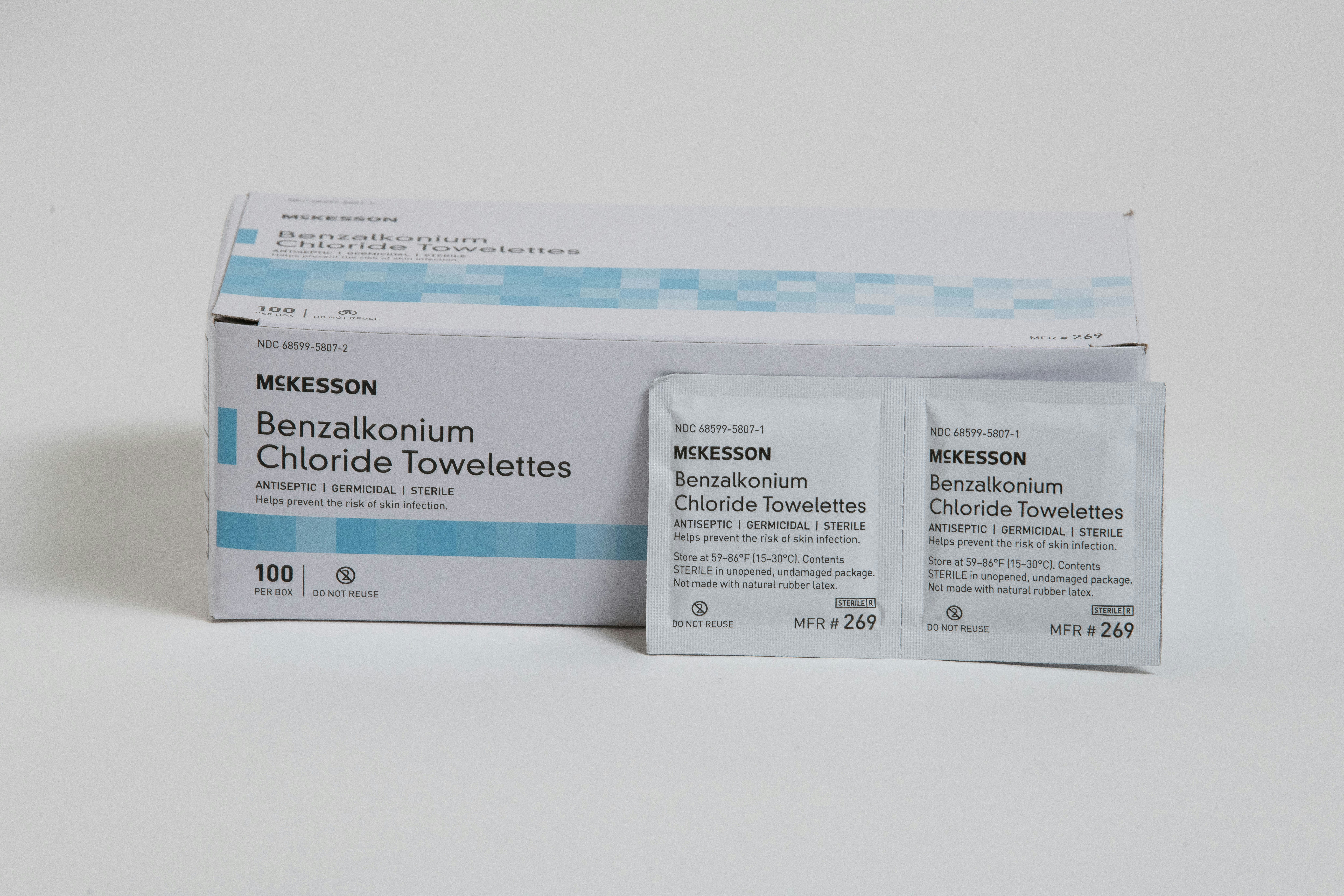 two packets of benexolonium sit next to each other