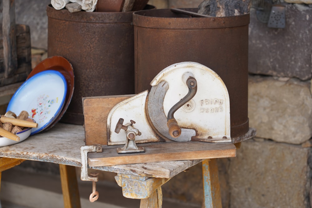 a pair of scissors and a plate on a table