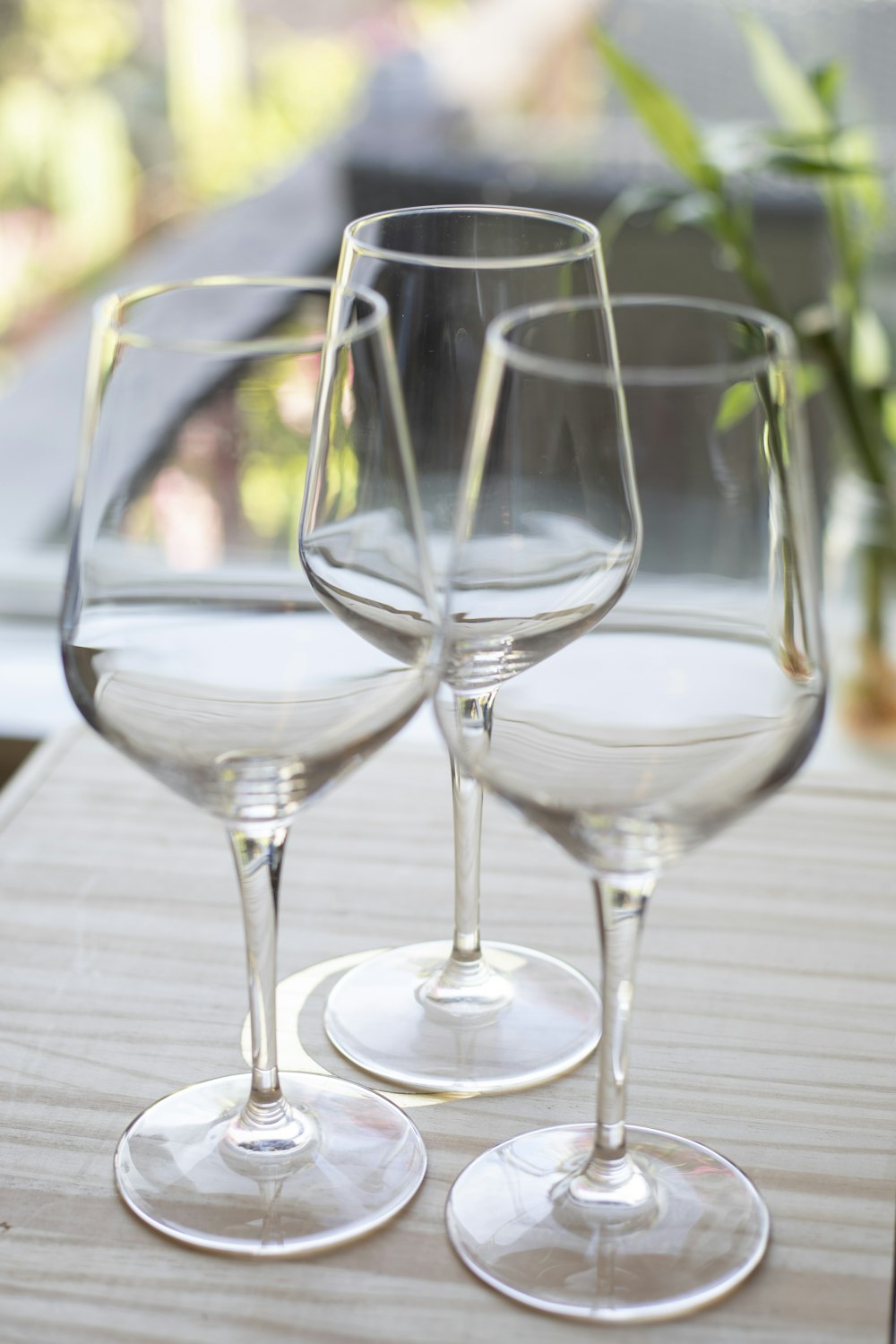 two empty wine glasses sitting on a table