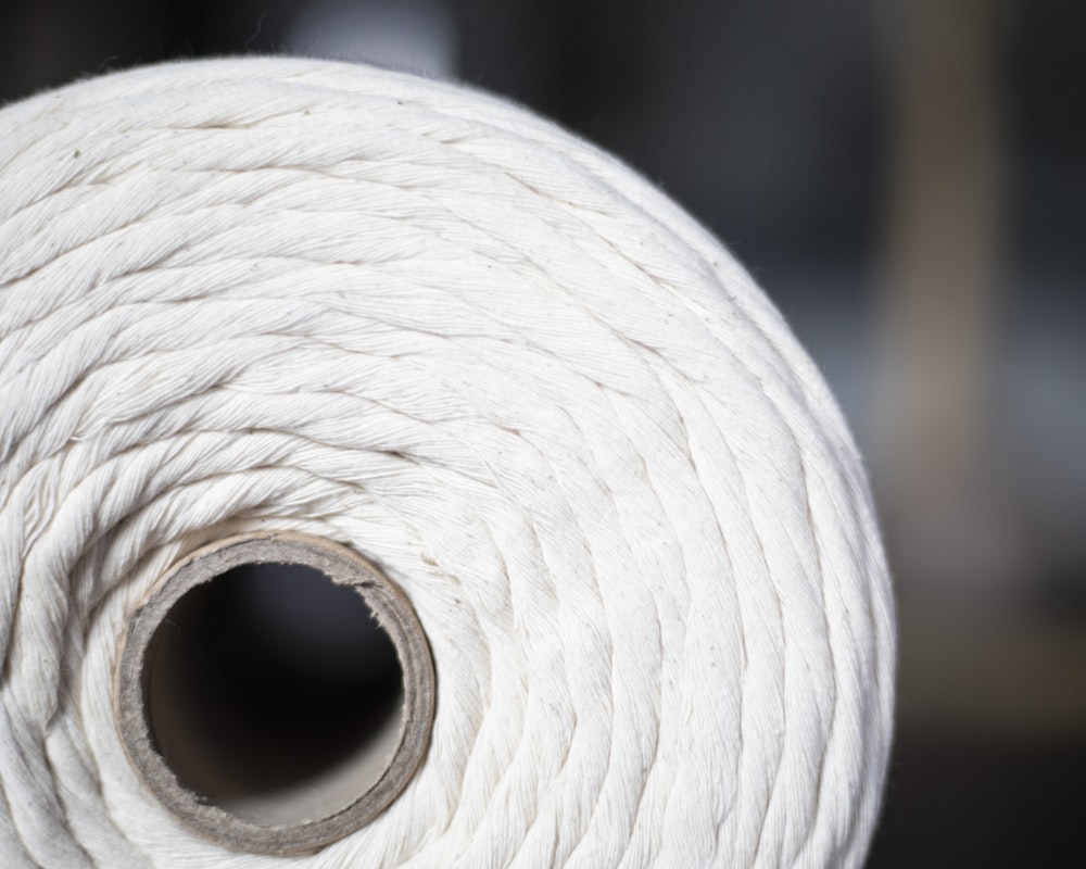 a close up of a ball of white yarn