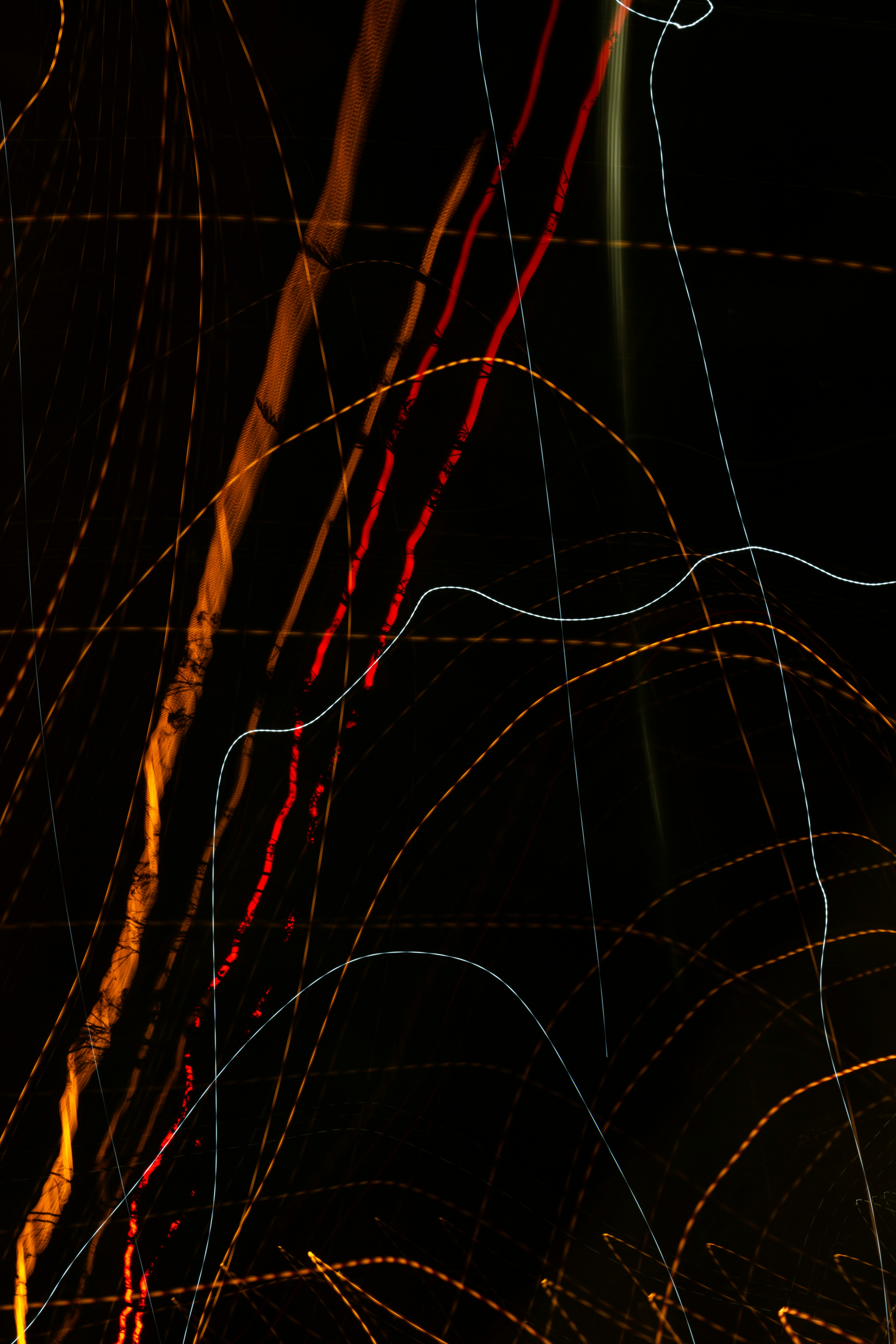 an abstract photo of a street light at night