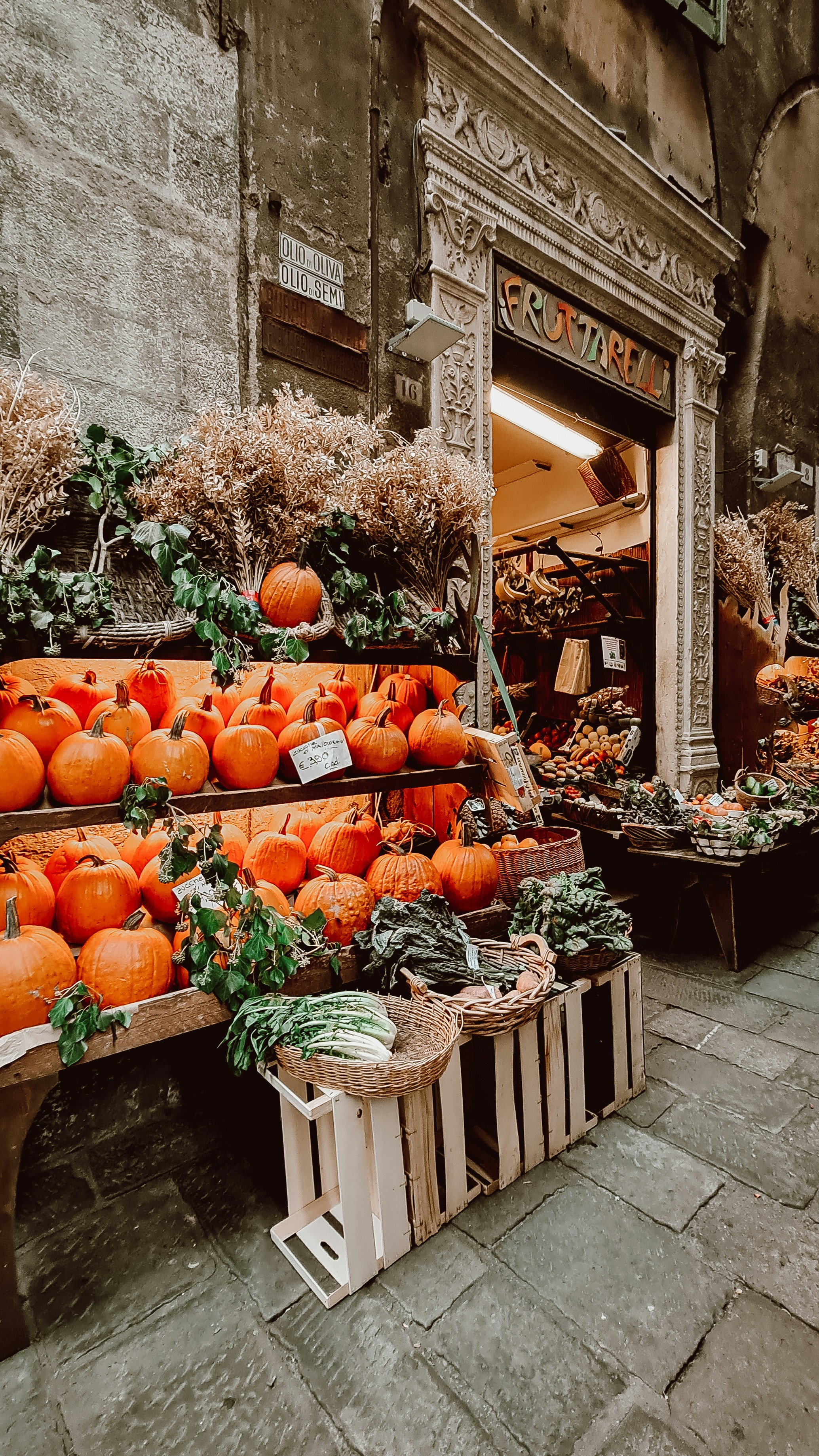 a bunch of pumpkins that are on a table