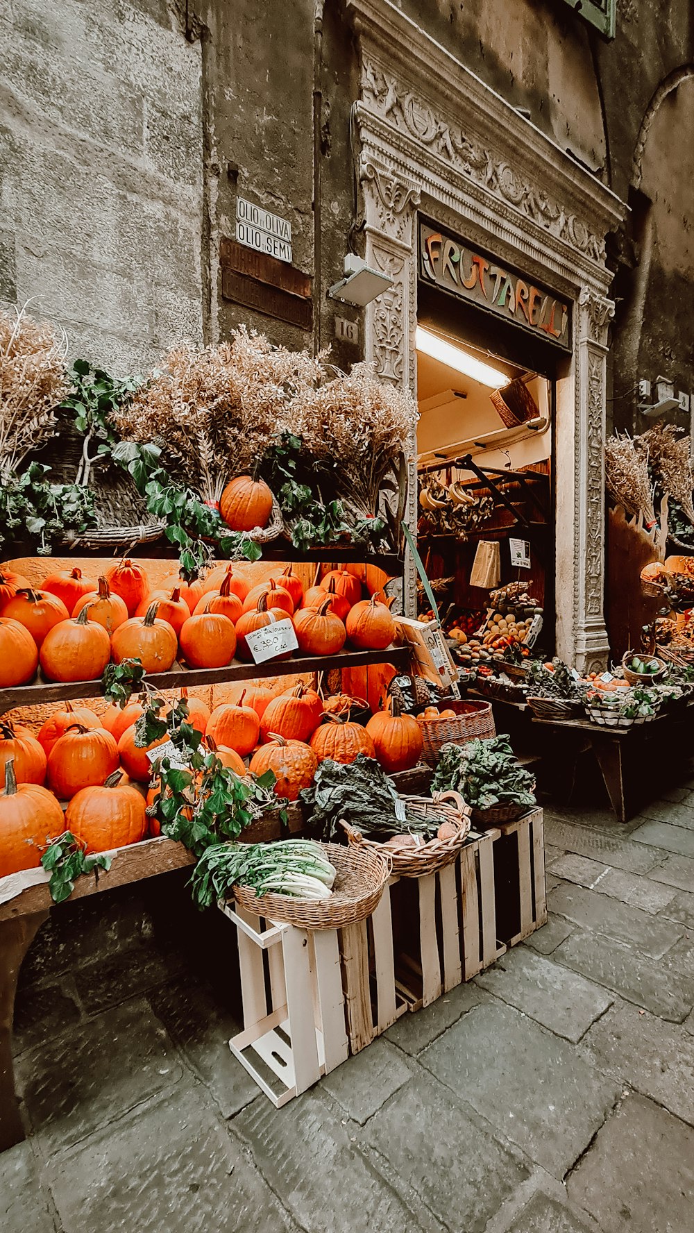 a bunch of pumpkins that are on a table