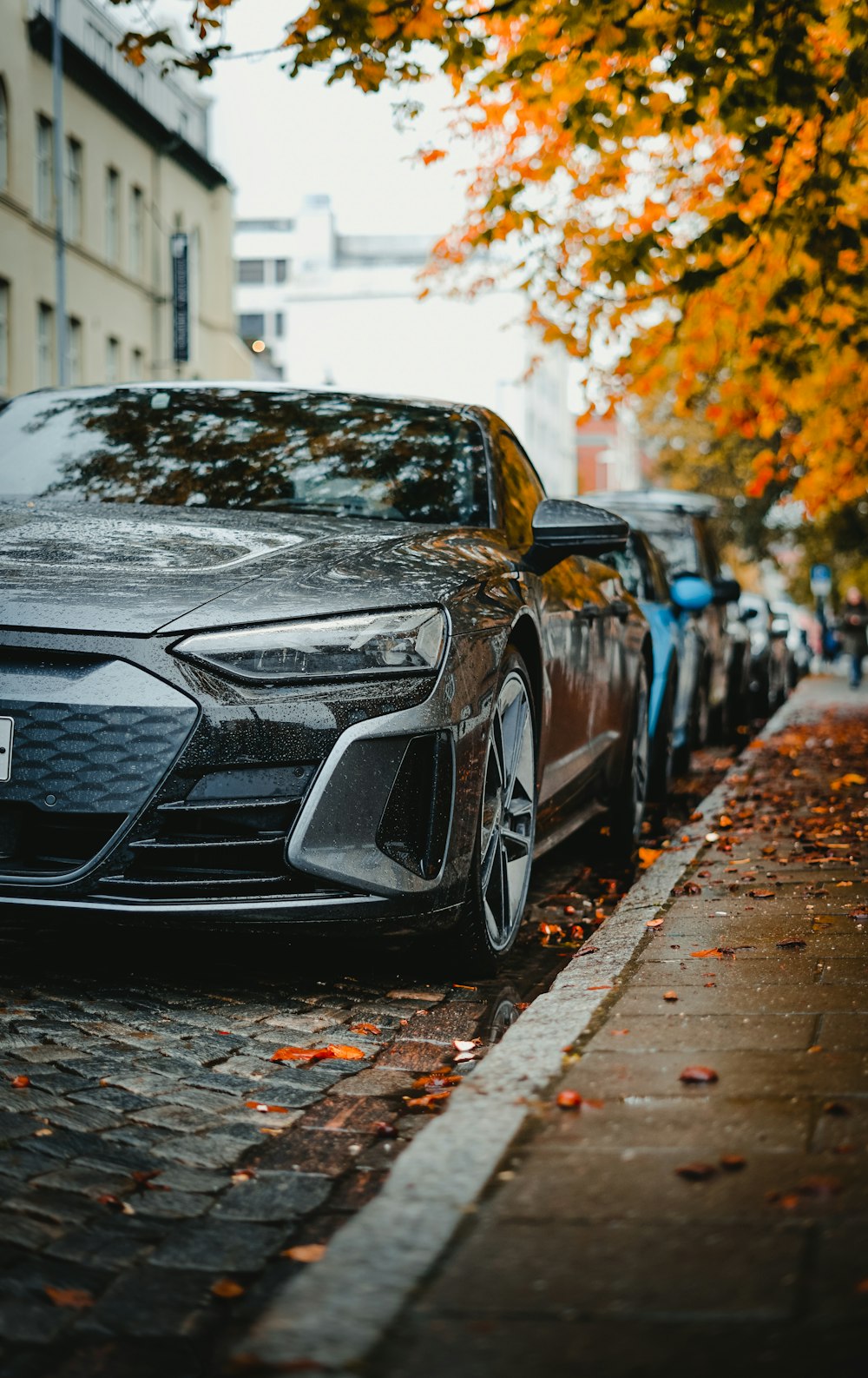 a line of parked cars on a city street