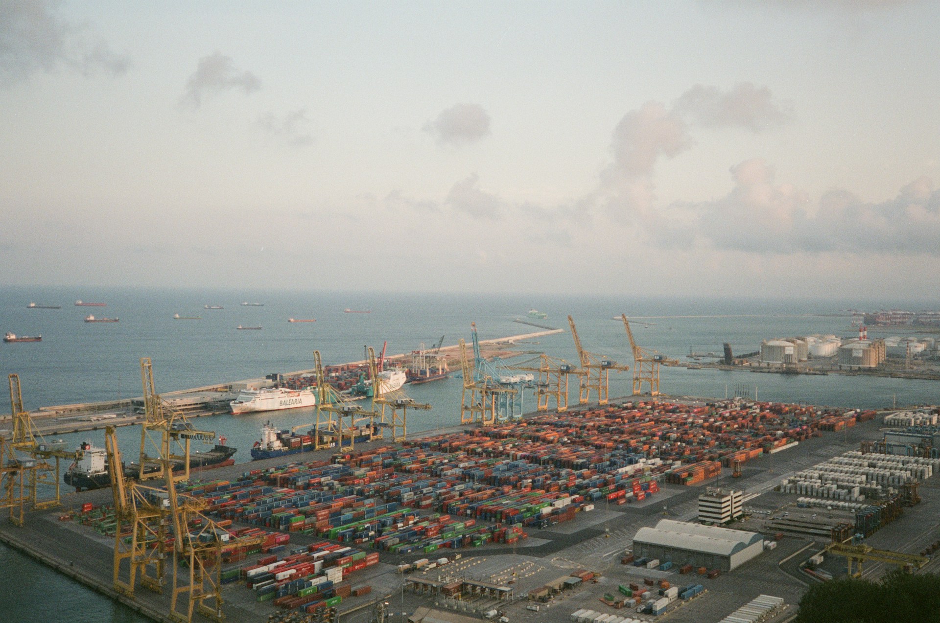 woman wearing yellow long-sleeved dress under white clouds and blue sky during daytime