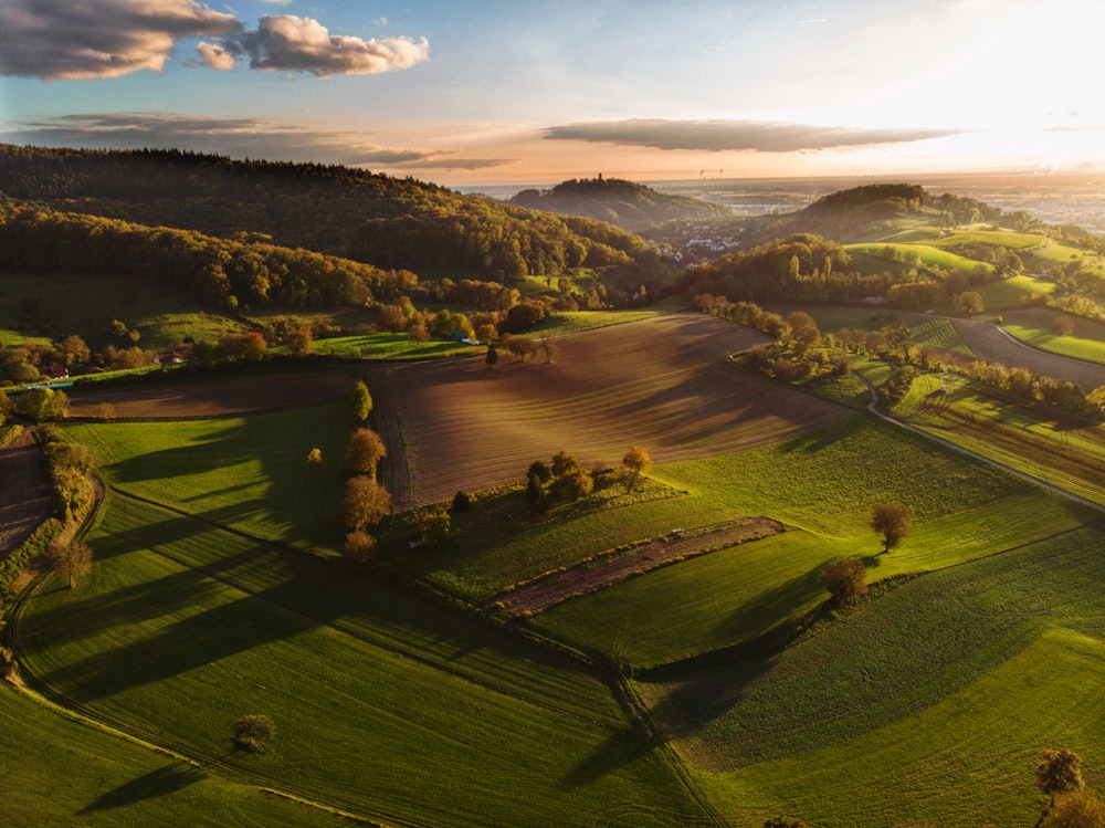 an aerial view of a countryside with rolling hills