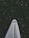 a person's feet with sunglasses and a white cloth covering them