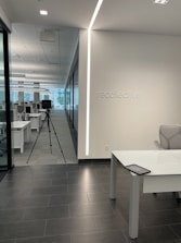 a room with a desk and a camera in it