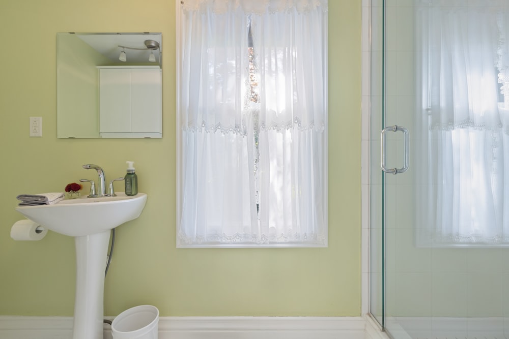 a bathroom with a sink and a shower