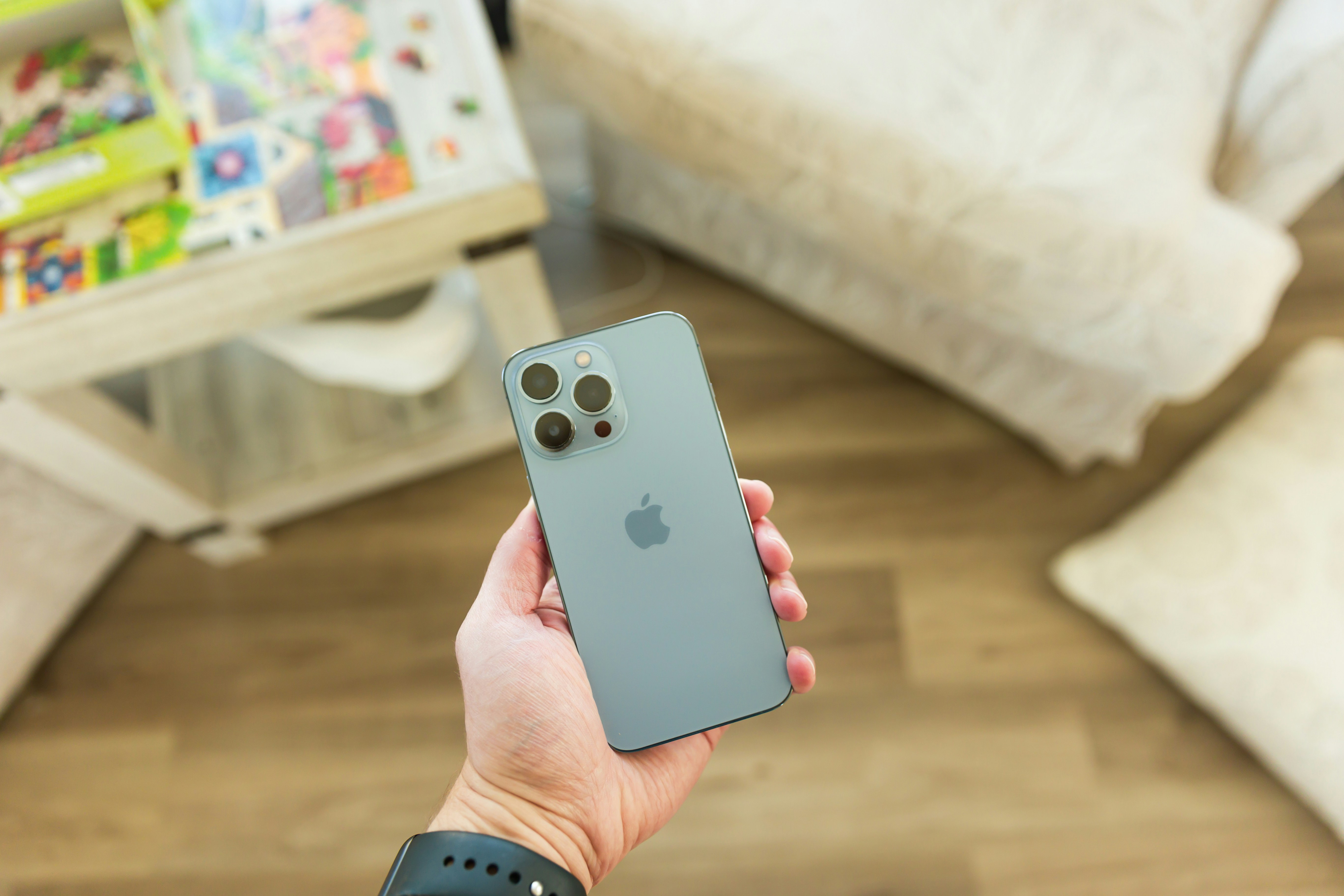 a person holding an iphone in their hand