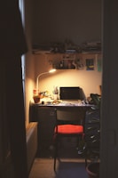 A cozy office space with a desk and paperwork.