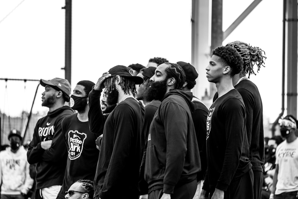 a group of young men standing next to each other