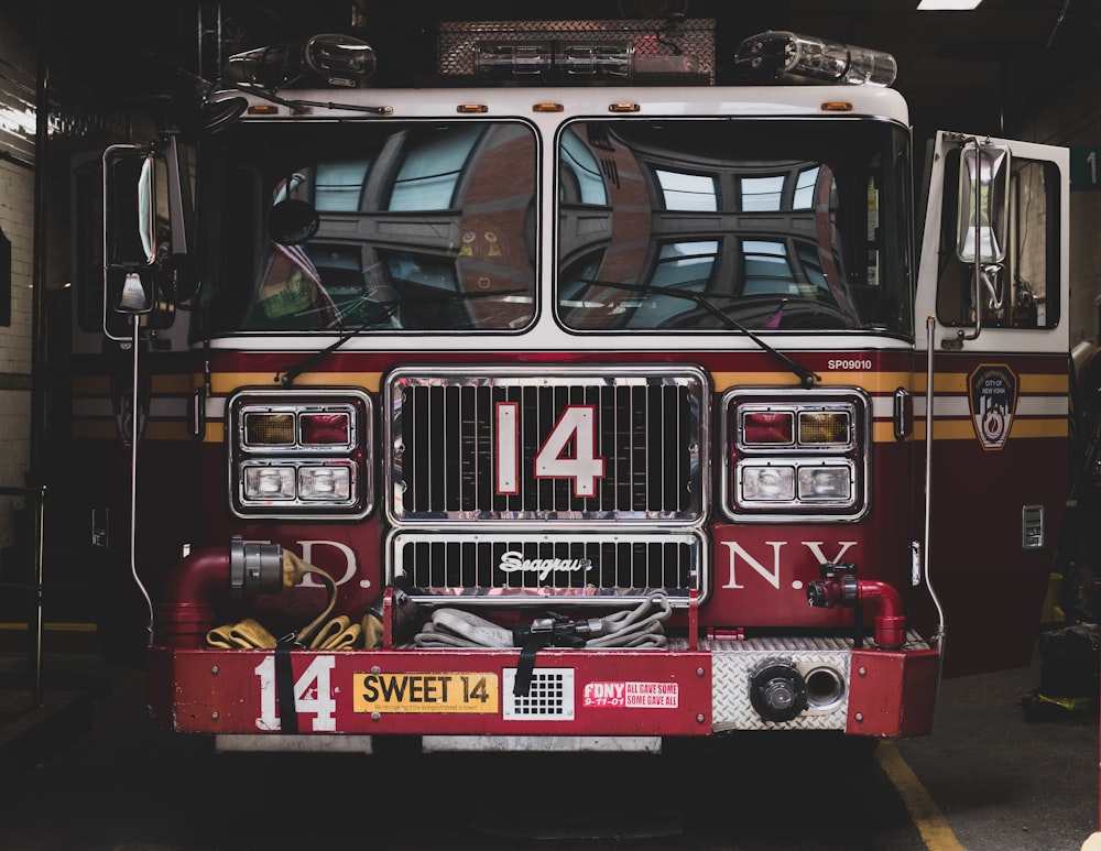 a fire truck is parked in a garage