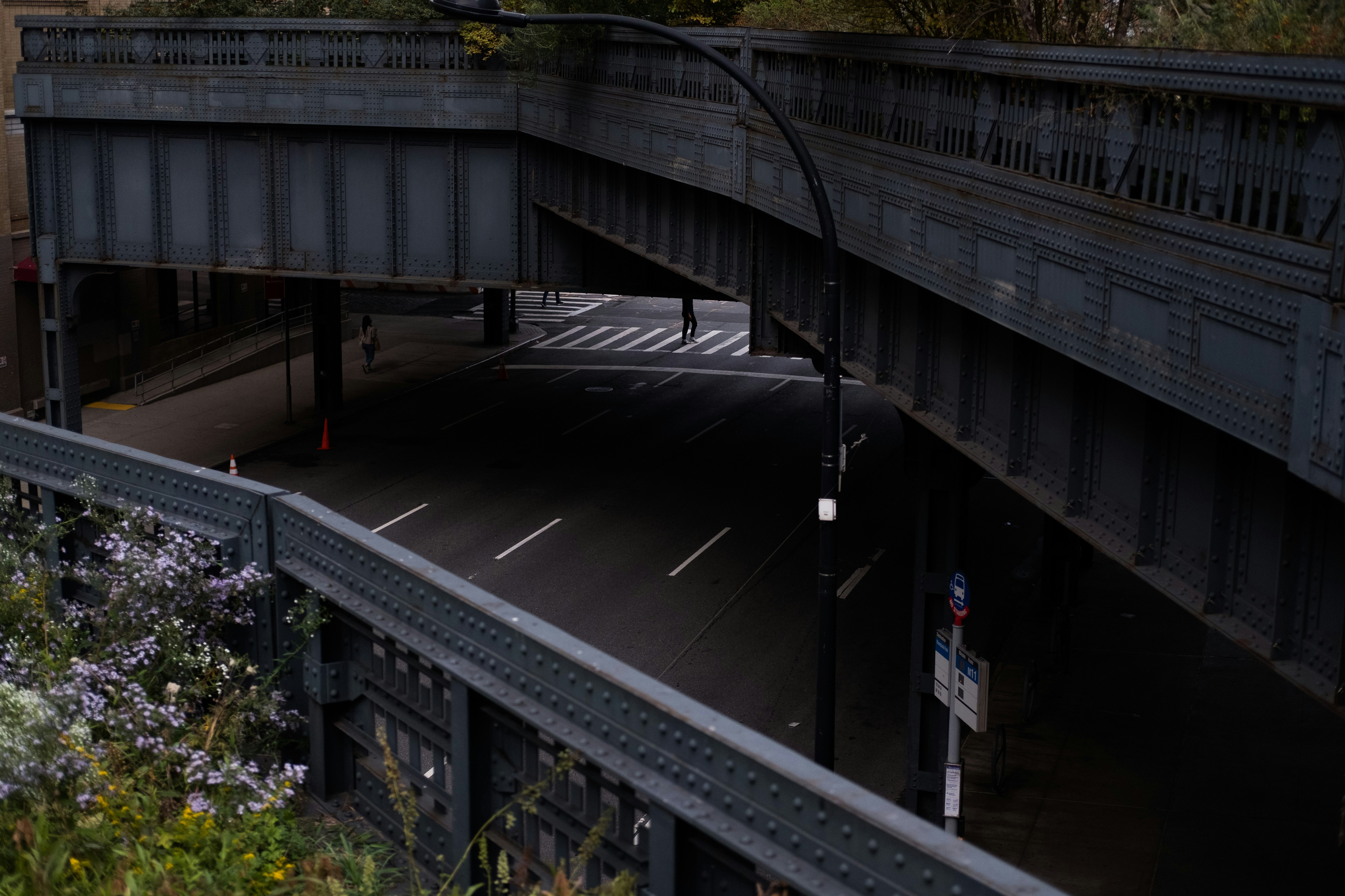an overhead view of a city street and a bridge
