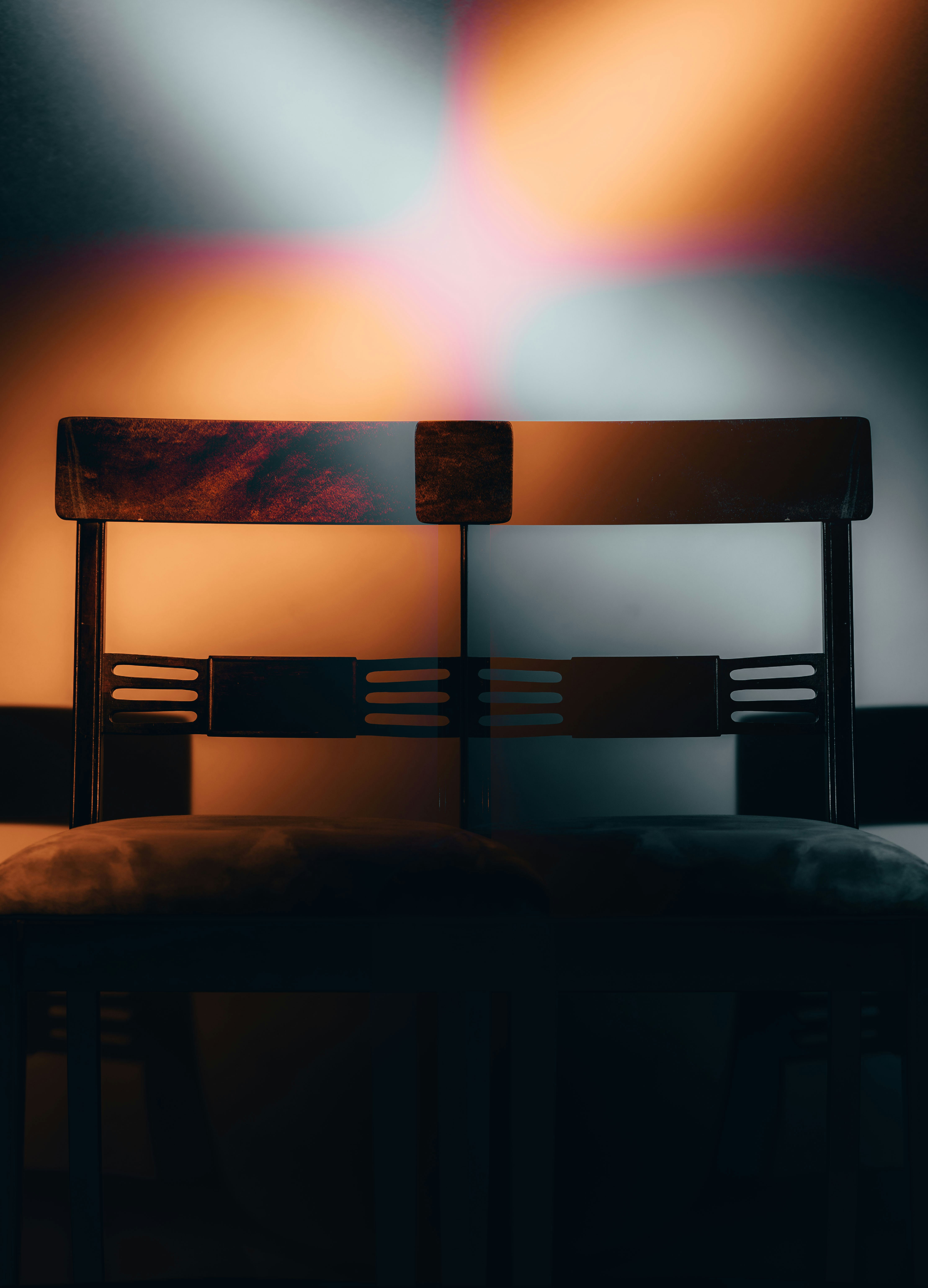 a bed with a wooden head board in a room