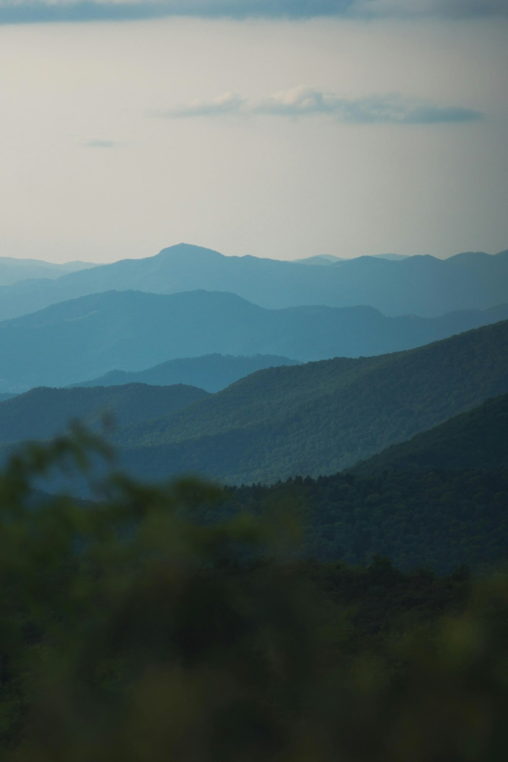 a view of a mountain range from a distance