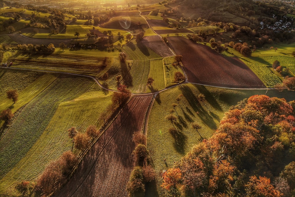 an aerial view of a rural countryside at sunset