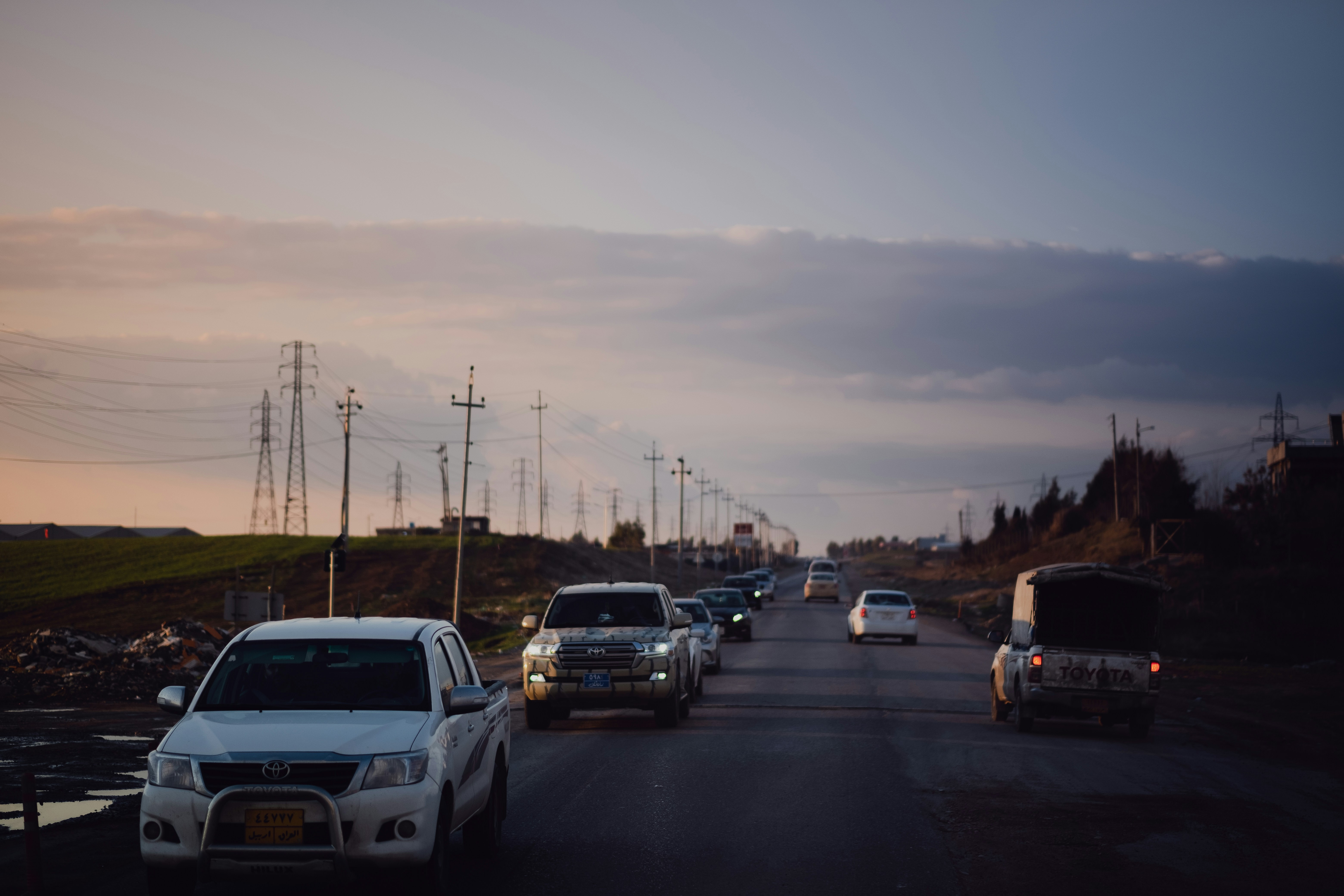Family driving together inside a modern electric sedan
