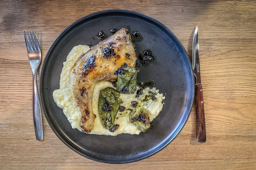 a plate of food on a wooden table